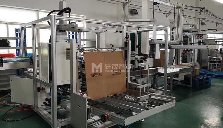 韓國(guó)紙巾開(kāi)裝封一體機(jī)+碼垛機(jī) 韓國(guó)紙巾開(kāi)裝封一體機(jī)+碼垛機(jī)